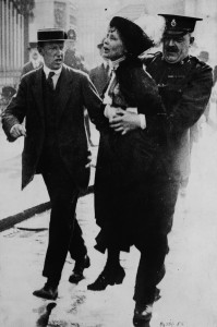 British suffragette leader Emmeline Pankhurst being arrested by police outside Buckingham Palace in 1914